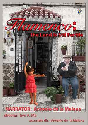 Image for film: An elderly man is sitting on a chair outside his front
                    door clapping his hands to give rhythm to a tiny girl, dressed in a coral-colored outfit, as sne dahcne.